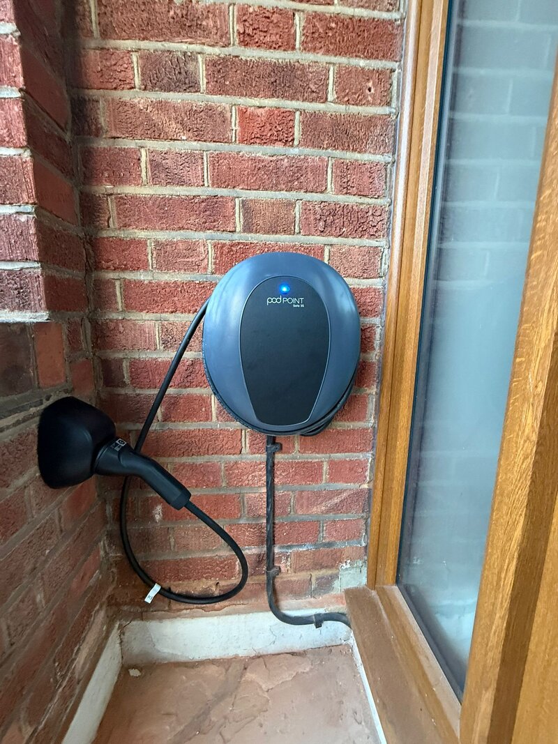Clean wall-mounted EV charger in Essex flat