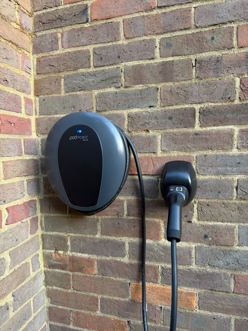 Clean wall-mounted EV charger in London flat