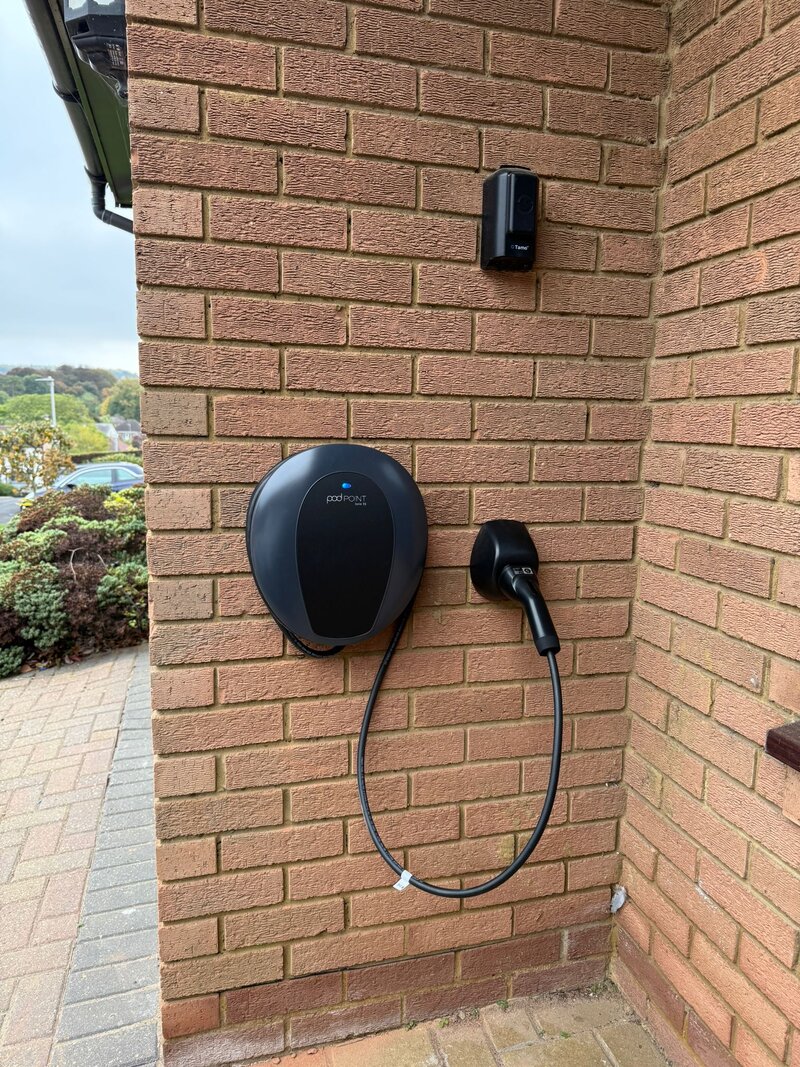 Clean wall-mounted EV charger in North London home